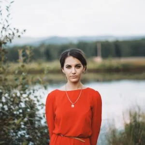 woman standing in front of body water